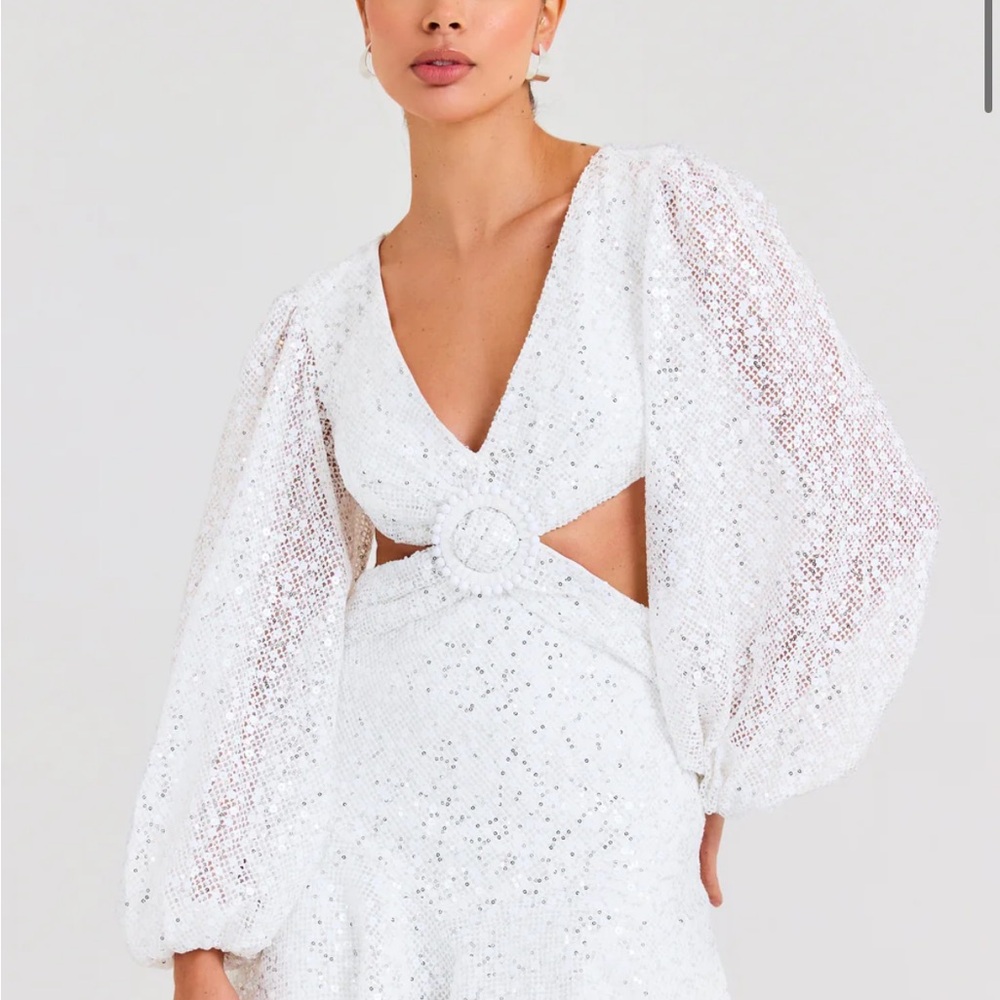 Elegant White Cutout Dress with Puff Sleeves